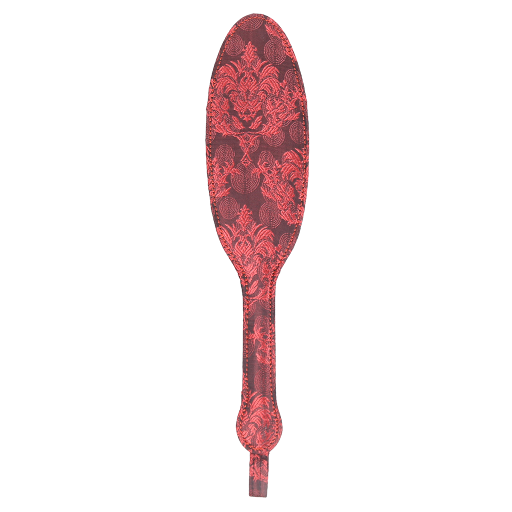 Decorative paddle with red vintage floral pattern on a white background